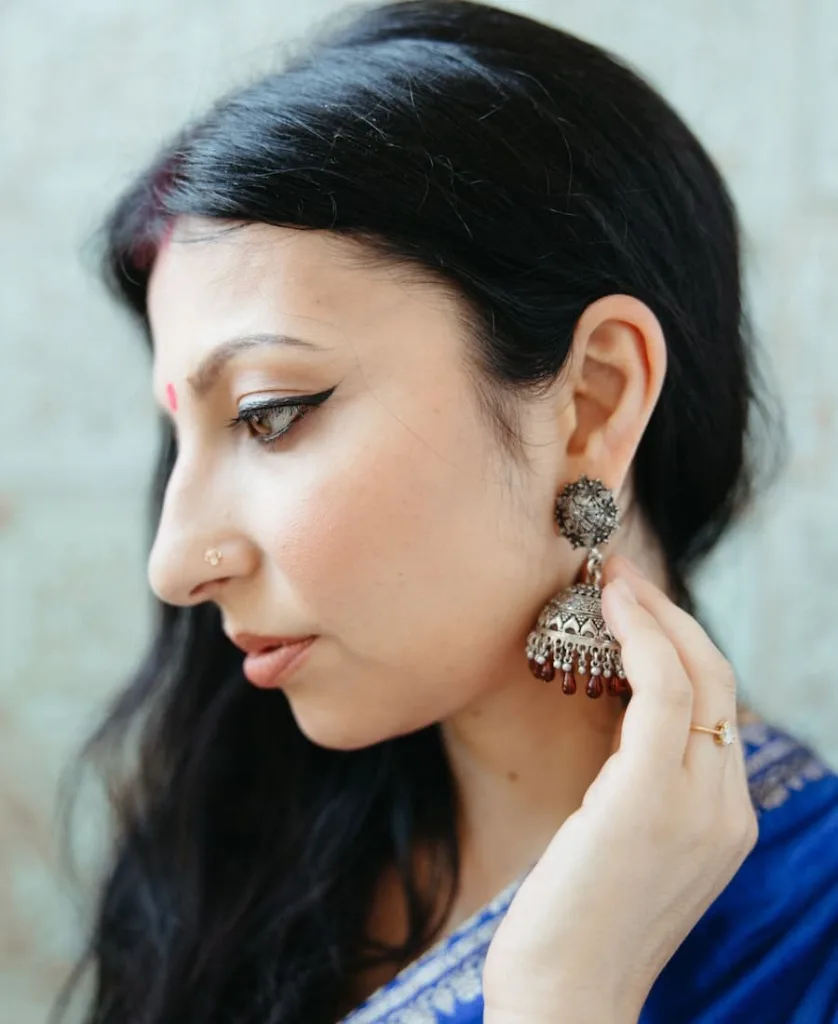 woman showing nose piercing